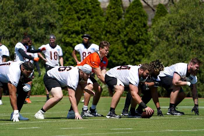 Cincinnati Bengals quarterback Joe Burrow (9) takes a snap during practice, Tuesday, May 17, 2022, at the Paul Brown Stadium practice fields in Cincinnati. Cincinnati Bengals Practice May 17 0106